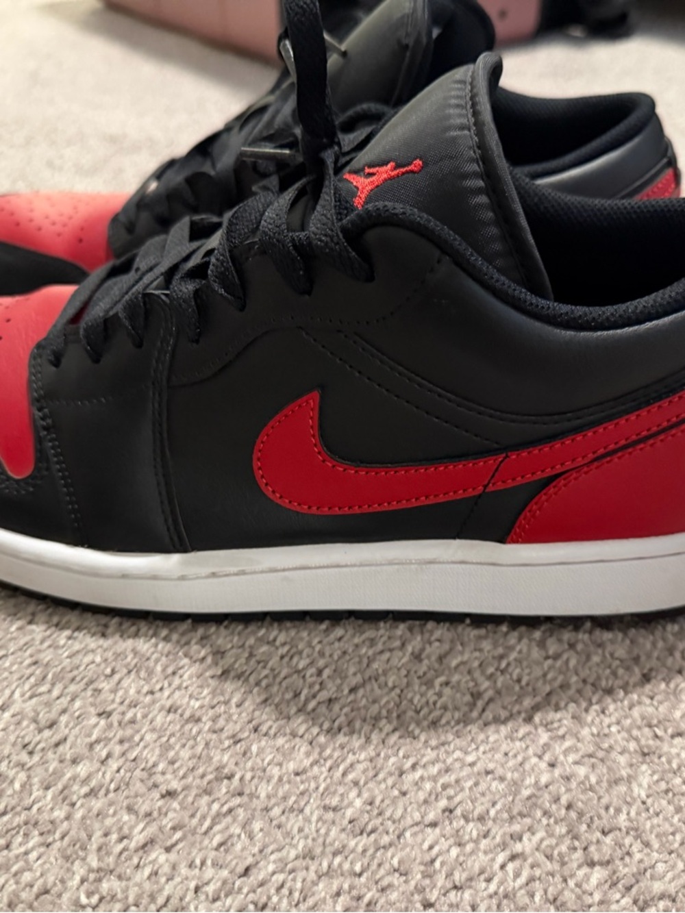 Nike/Jordan 1s Low-Top Sneaker in Black and Red